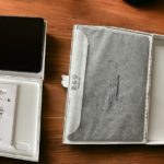 a box of Samsung Galaxy Tab S8 tablet with a cover and a card in it